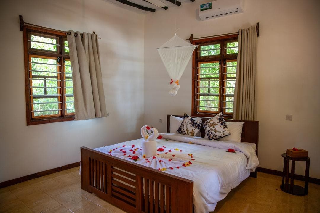 Ocean-front suite bedroom at Veridiana Hotel Zanzibar