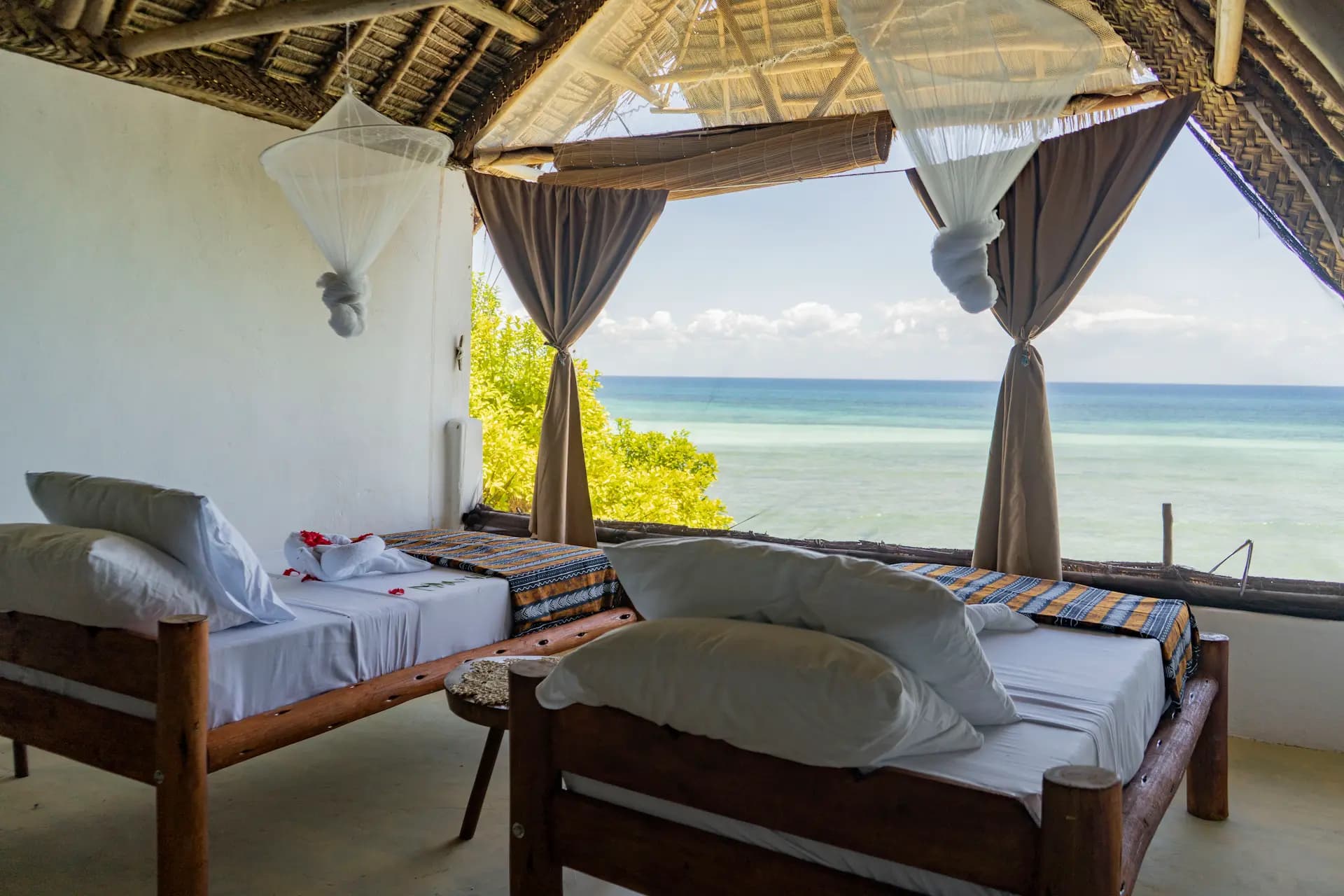Deluxe Room Ocean View bedroom at Veridiana Hotel